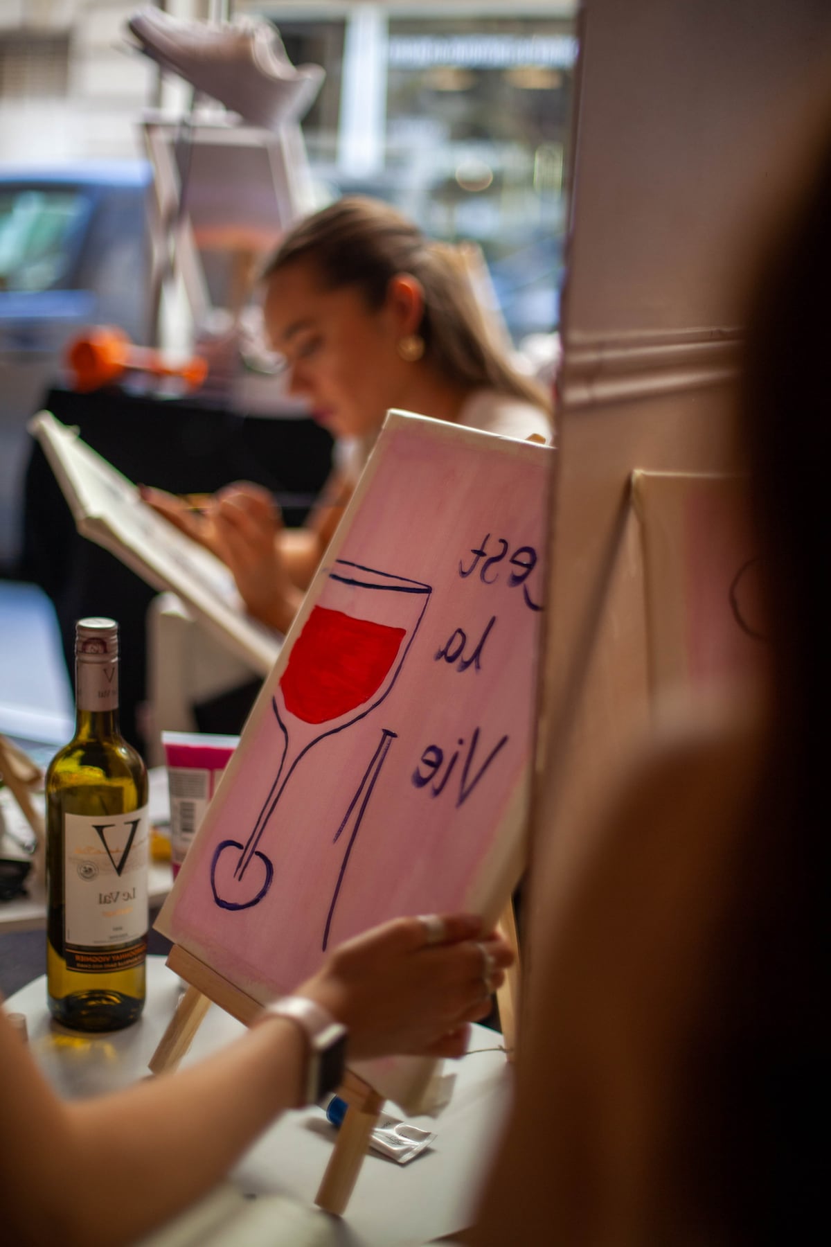 Painting experience in an art cafe