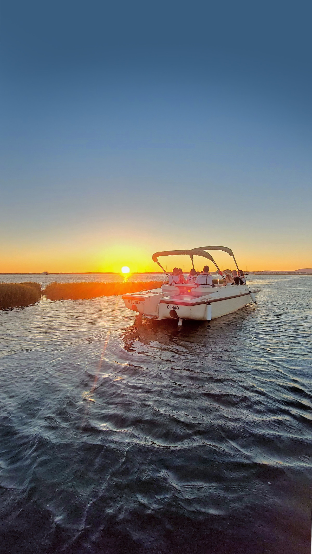 Contemplate the sunset in Ria Formosa