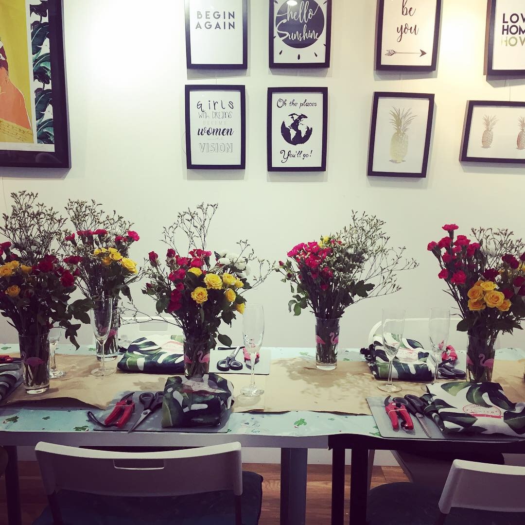 Create colorful flower crowns with a local artist