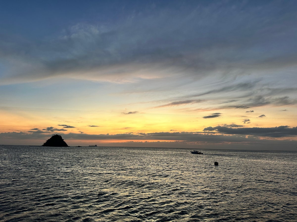 Sunset sailing on a catamaran with an open bar