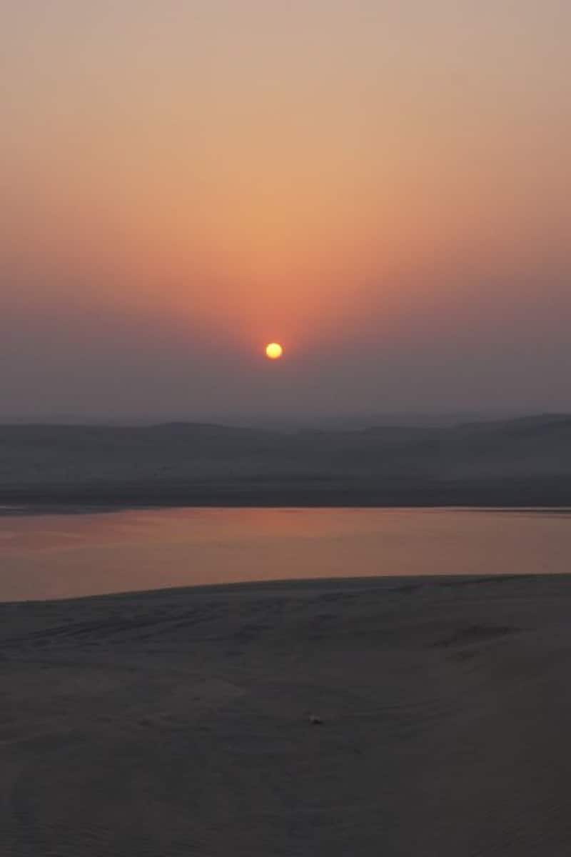 Watch sunrise where the desert meets the sea