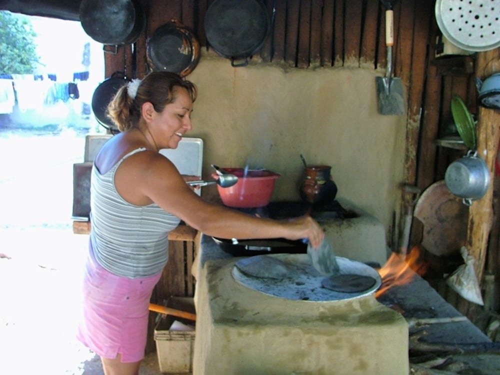 Prepare a Mexican meal with a local family