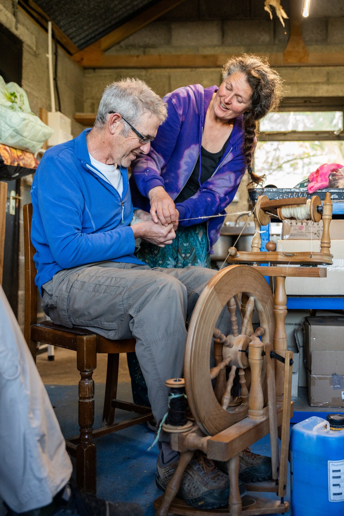 Spin Highland wool with a textile artisan