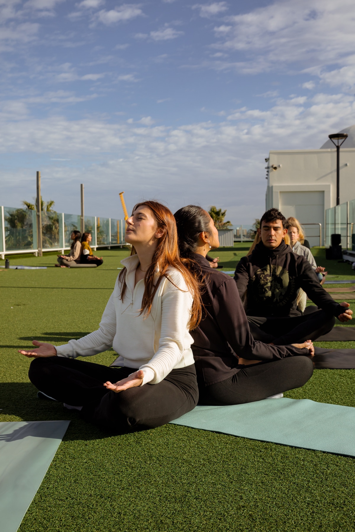 Align with seas rhythm with rooftop yoga