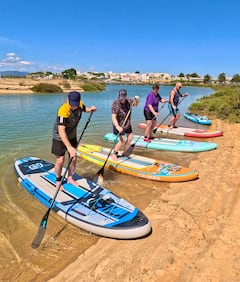 Paddleboard en las tranquilas aguas de la laguna de Alvor y fotos
