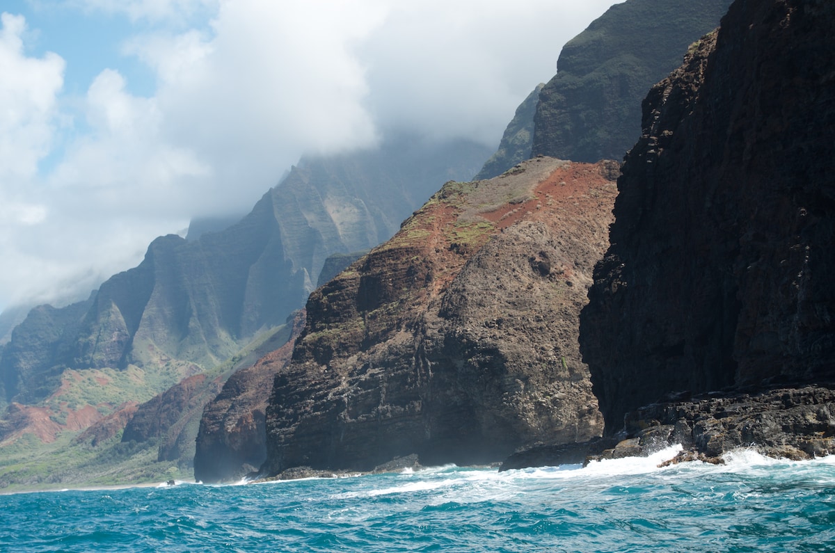 Explore the Na Pali coastline by boat
