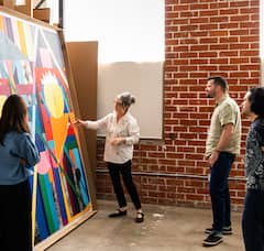 Art vault and exhibit tour with a gallery founder