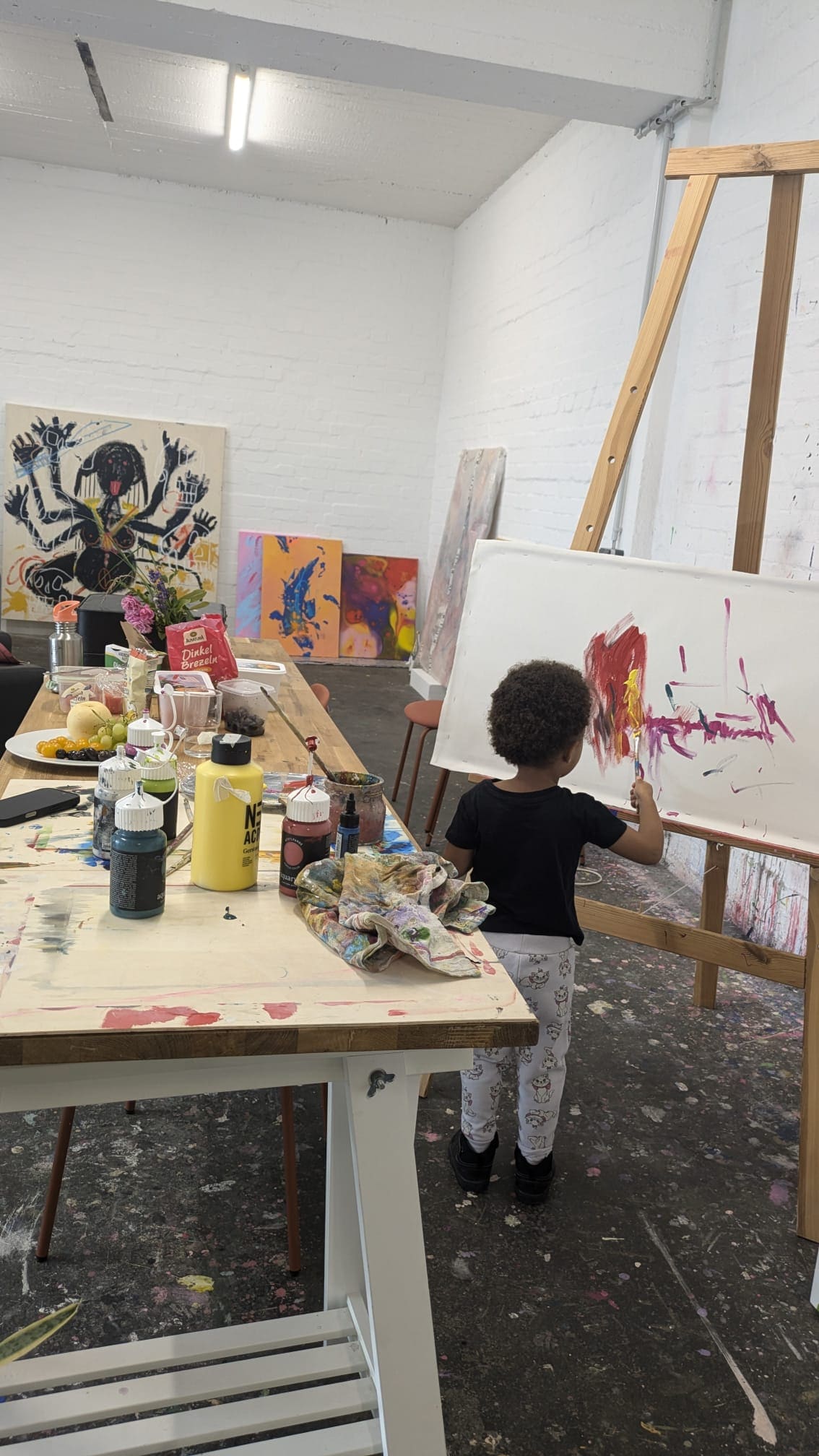 Family painting at local art studio