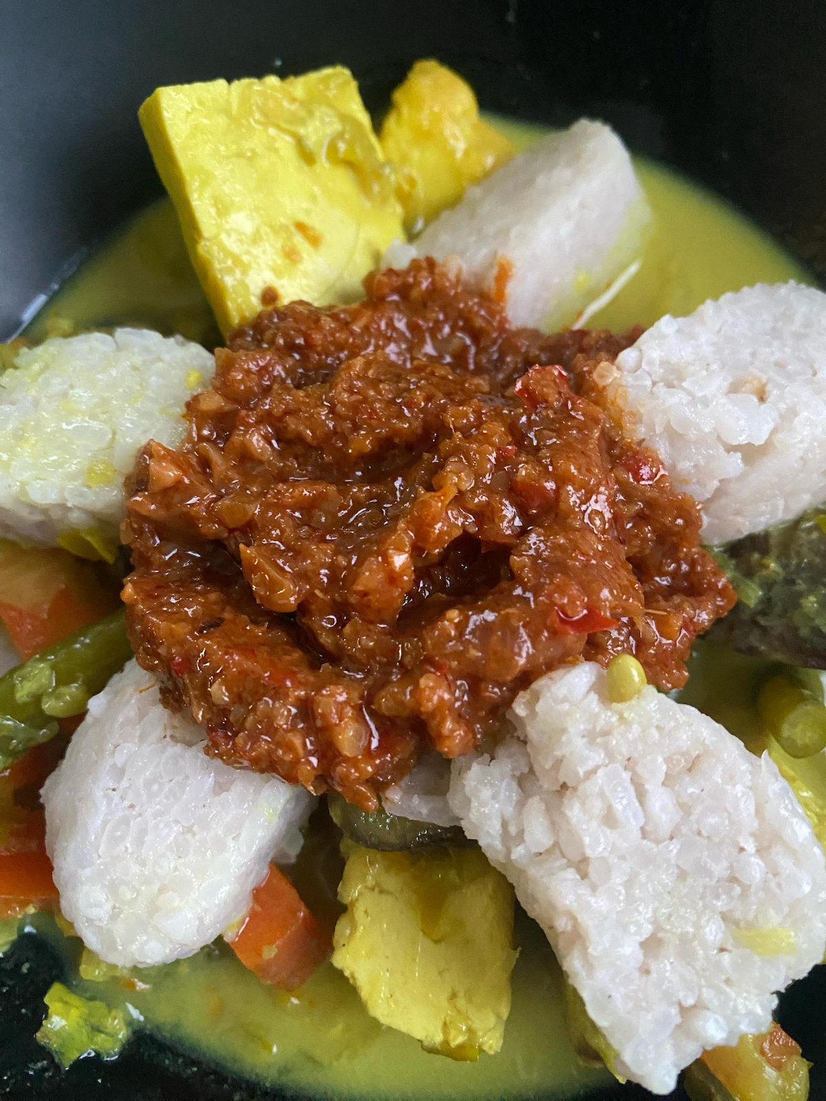 Visit a market and cook Malaysian food with a chef