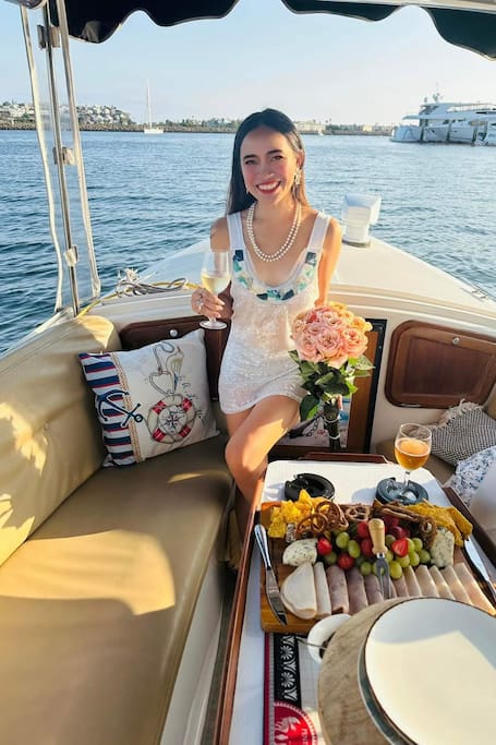 Cruise the Marina on a luxury Eboat with an Artist