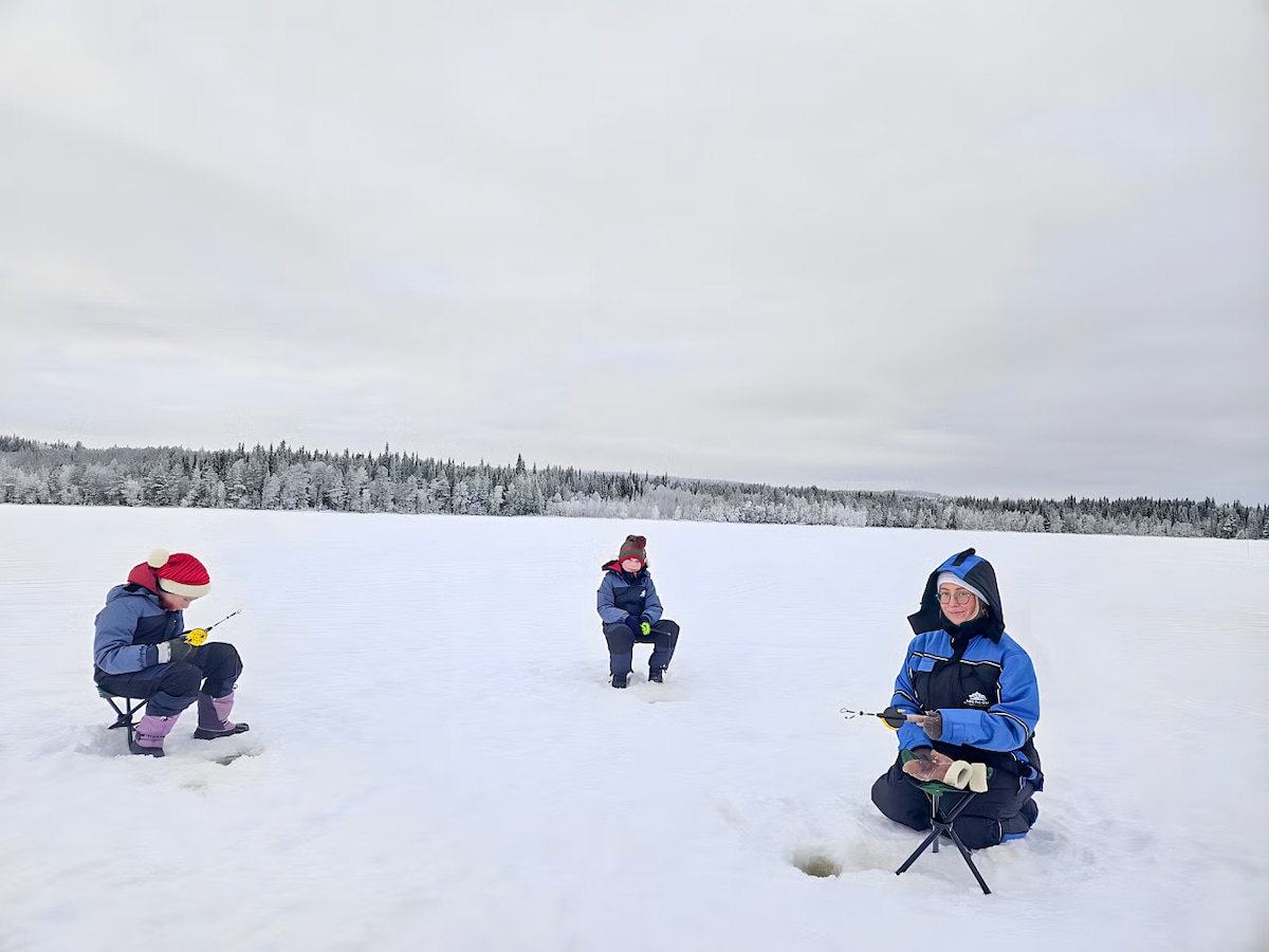 Ice Fishing Safari with Barbecue in Lapland