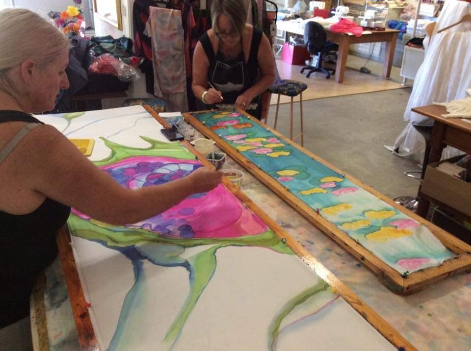 Paint silk scarves with an artisan