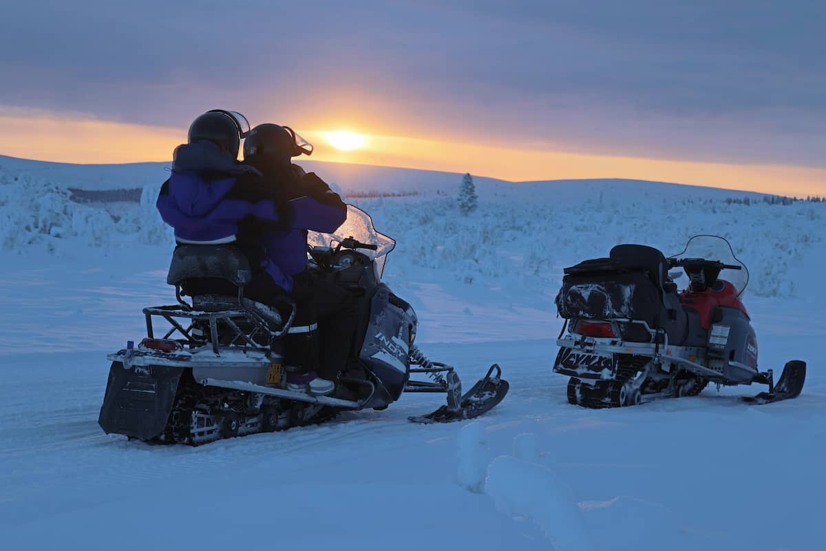 Snowmobile Adventure in Lapland Wilderness