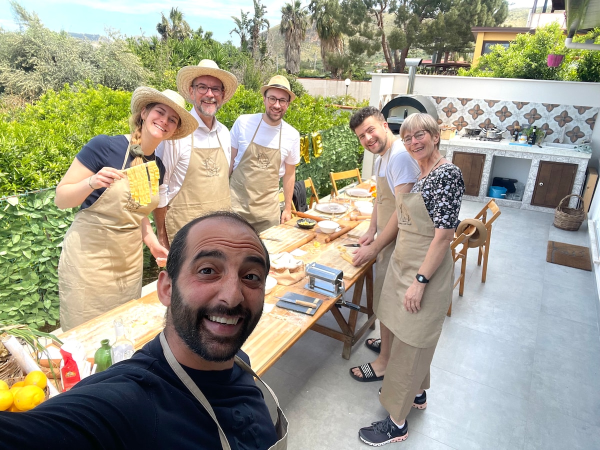 Cooking class in a villa with Palermo view
