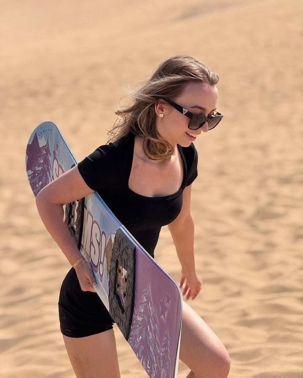 Sandboard the desert with a local guide