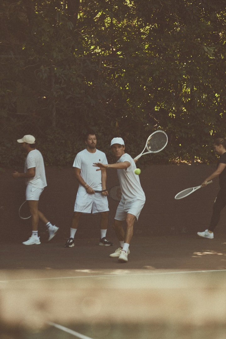 Play elite live ball tennis led by a pro