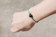 Crea tu propia pulsera de nudos lacada al estilo japonés en el taller privado de un maestro lacador.