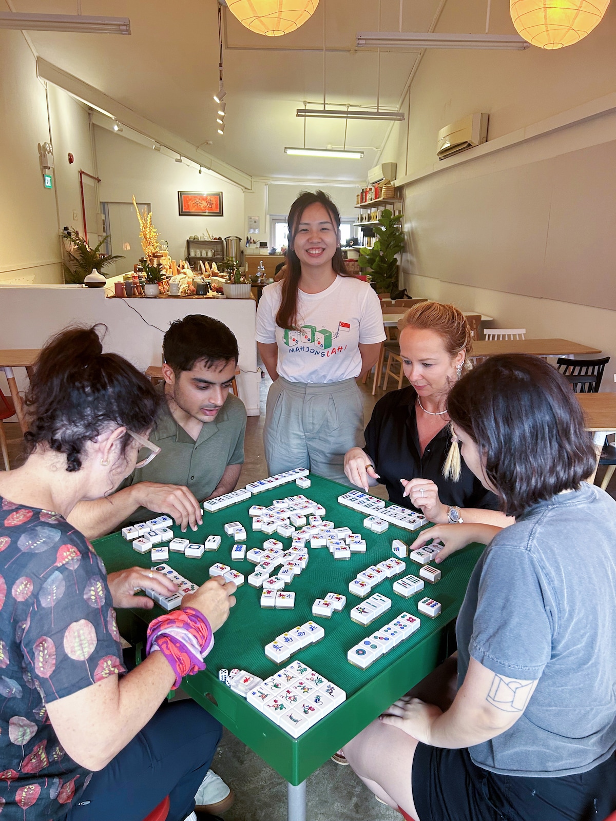 Learn to play Singapore Mahjong in a local home