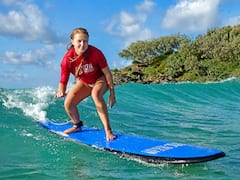 Aprende a surfear y paseo en 4x4 por la playa y el parque nacional