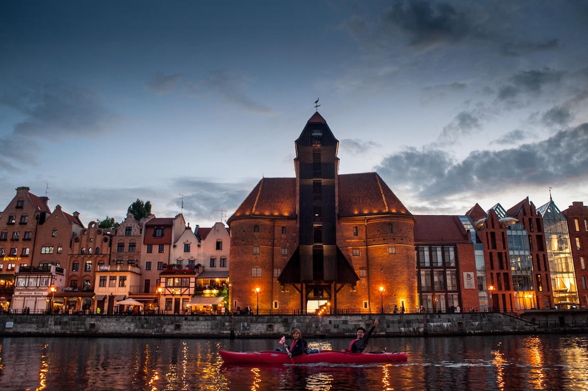 Kayak through Gdansk canals at sunset