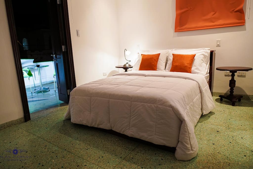 Room 1: privacy, double bed, air conditioner