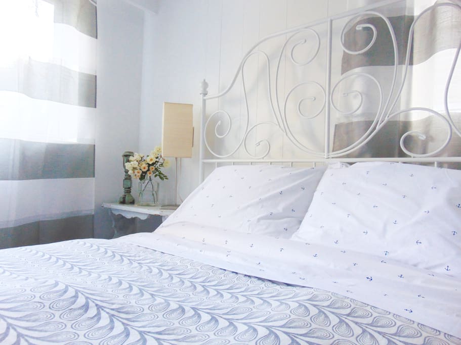 White wrought iron frame, double bed, new mattress.