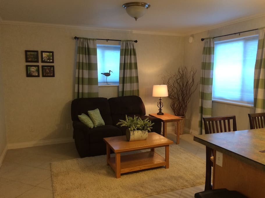 Bright, sunny and cheerful open concept living and dining area.