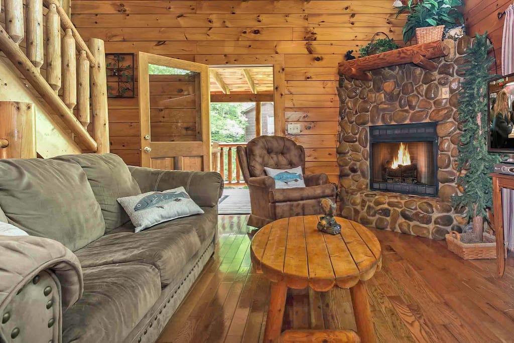 Snuggle up in the cozy den in front of the stacked river stone gas fireplace, also enjoy flat screen tv/dvd/cable!