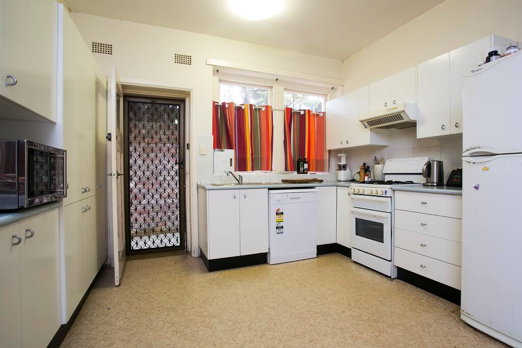 large kitchen with a gas stove, microwave, temperature adjusted kettle (great for green tea) food processor, all utensils for cooking (pots and pans etc) sharp cooking knife