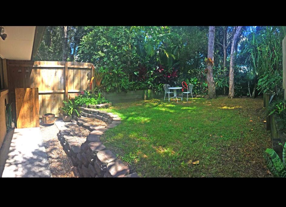 Private tropical garden at the back, there's a fire tub and fire wood provided.