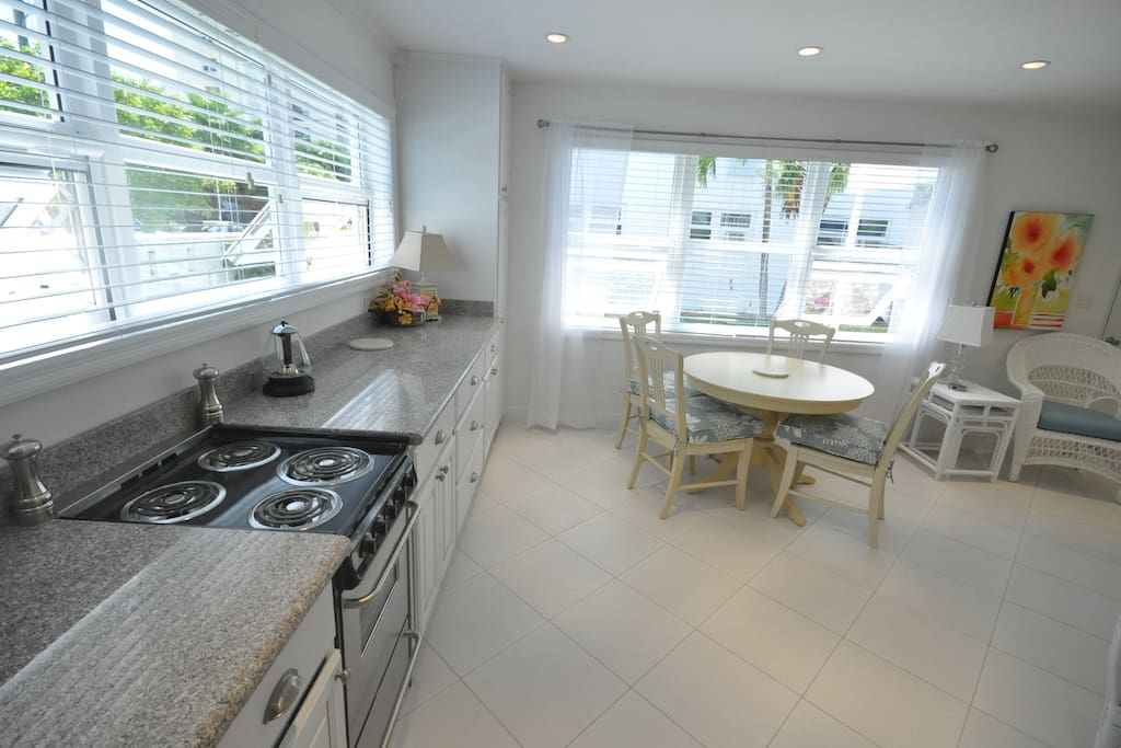Villa 9 has a fully equipped kitchen and a bright, comfortable dining area.
