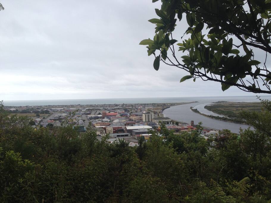 Another photo of the view of our house over the river and sea