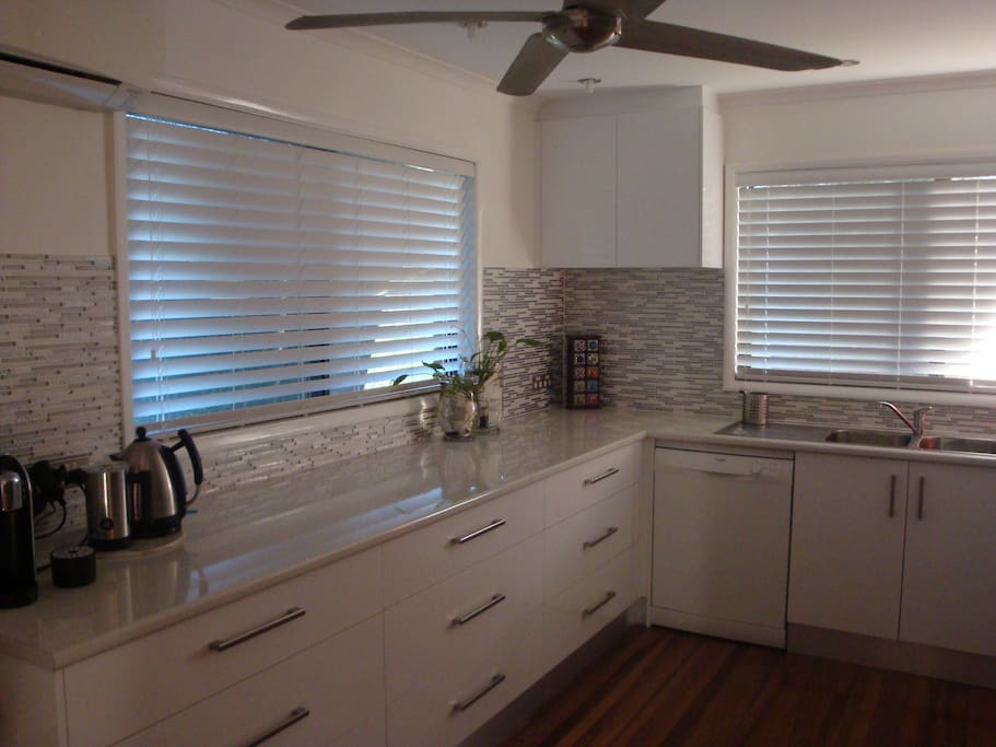 Executive kitchen with all the mod cons, pod coffee maker, dishwasher.