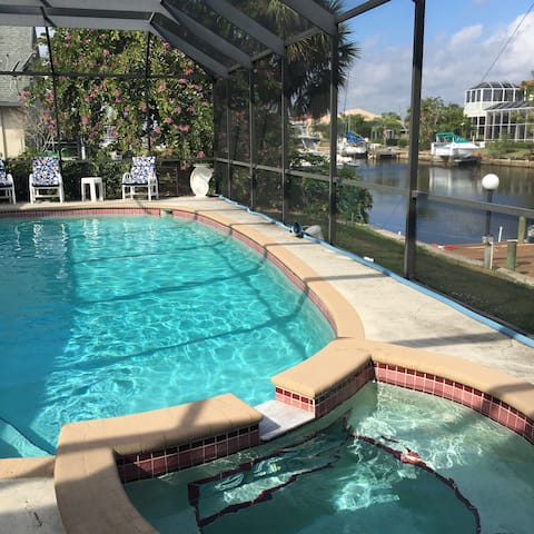 Elegant heated pool canal home in very quiet area.