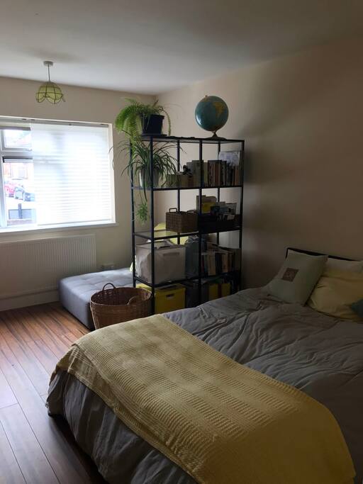 larger bedroom with chaise longue
