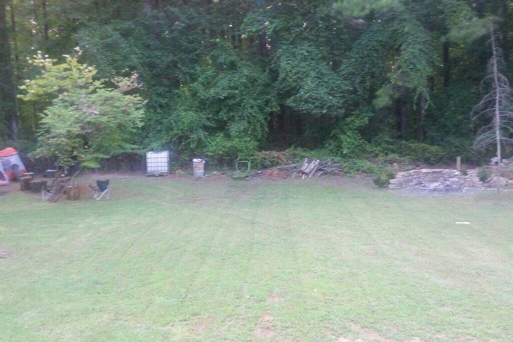Tent to your left. Firepit to your right.