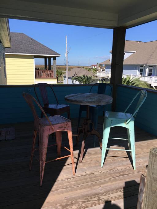 The back porch is perfect for morning coffee or a night cap.