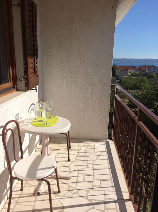 Sunny balcony with garden view