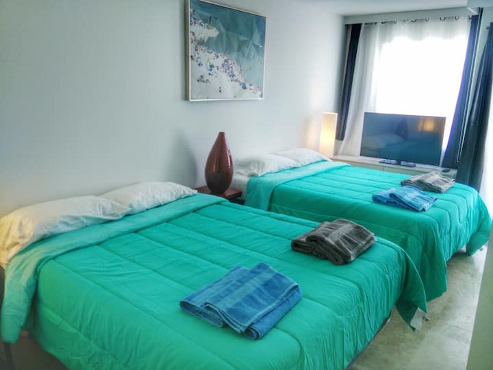 غرفة النوم الرئيسية ، رقم4 ، سريران كاملان (الوصول المباشر إلى الشرفة)