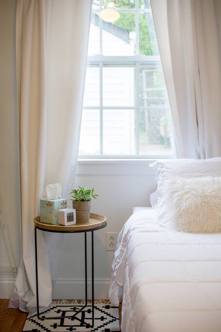Private photography/art studio sleeping area with twin sized bed.