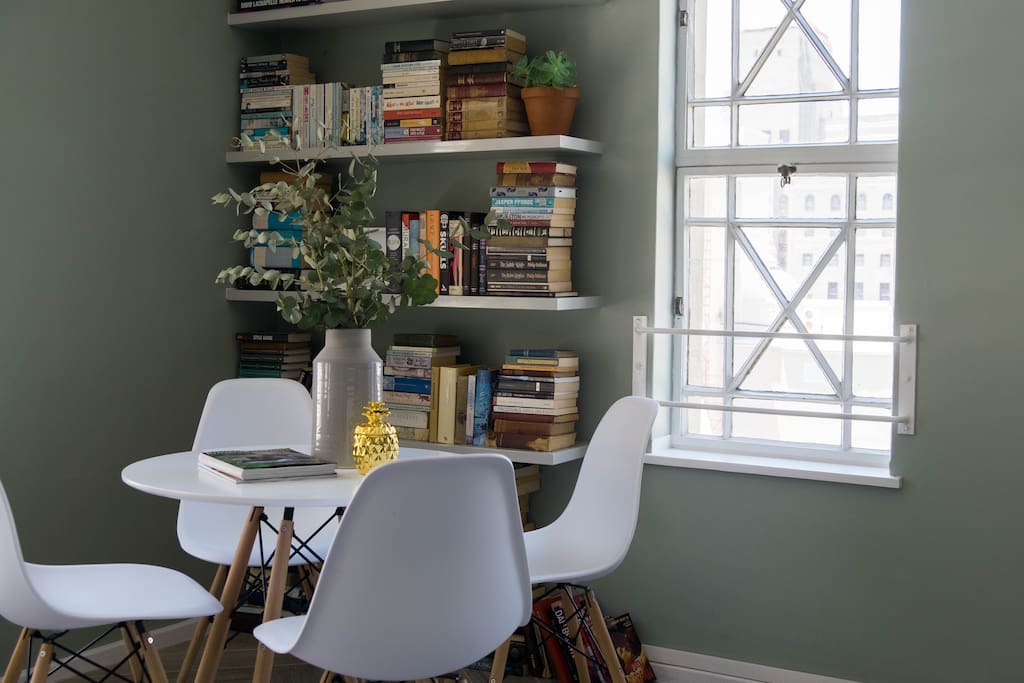 The breakfast nook doubles as a reading corner on sunny afternoons
