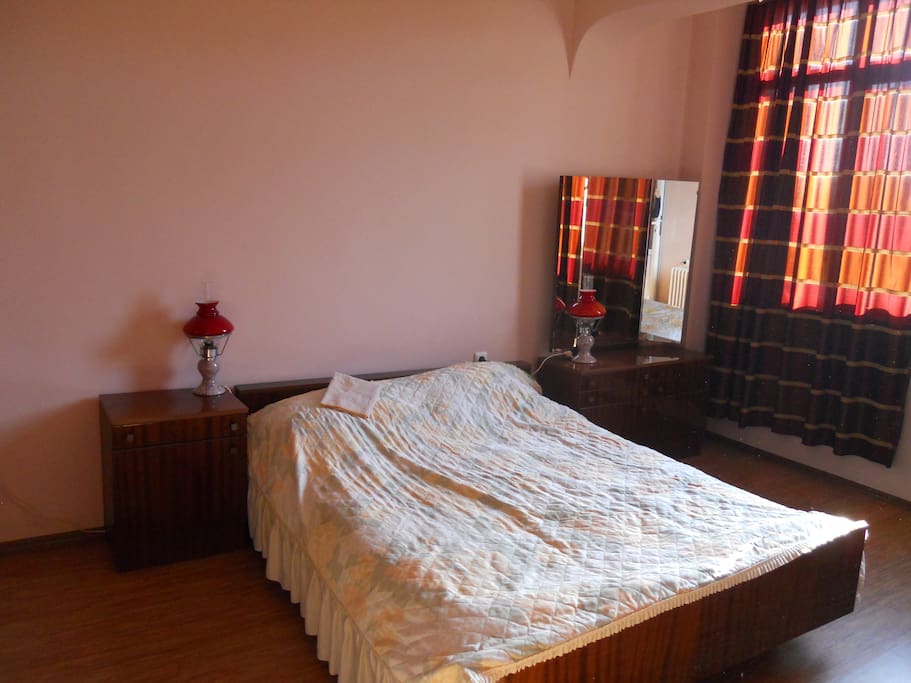 Spacious bedroom with queen size bed