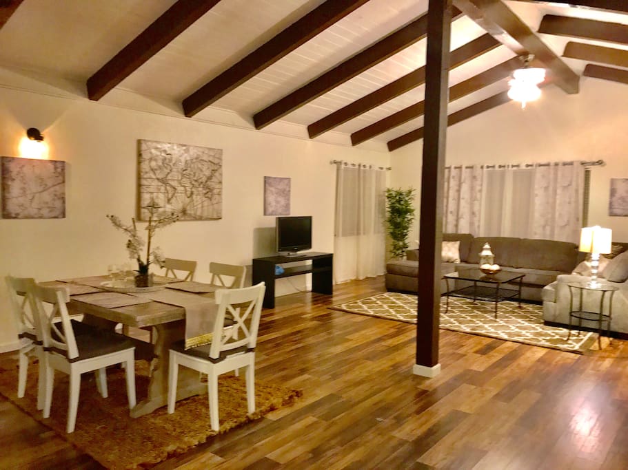The Open Living and Dining Area with Beautiful Exposed Beams
