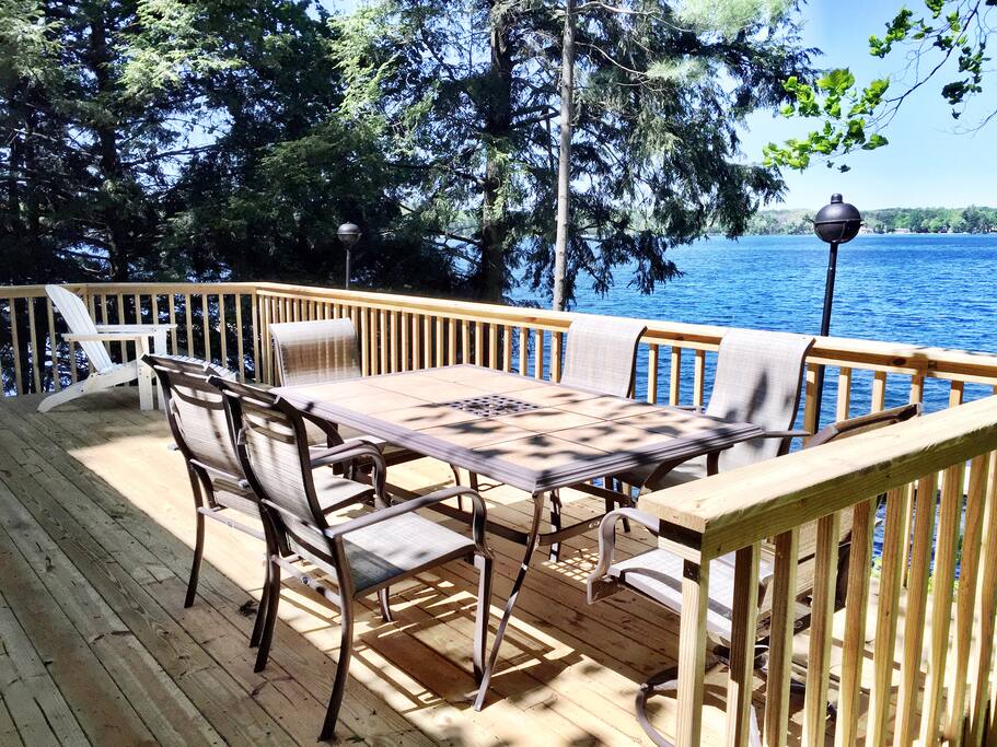 Seating outside on deck overlooking Long Lake.