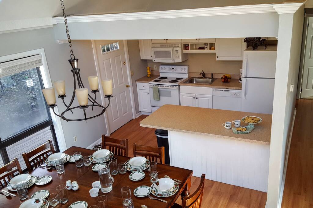 Modern Kitchen opens to Dinning and Living Room.