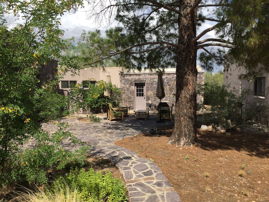 Private outdoor living area in the enclosed courtyard with plenty of cozy seating to enjoy the clear night skies
