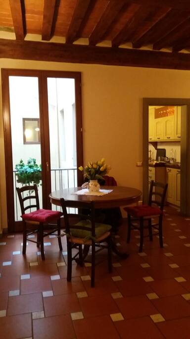 Typical Florentine Living Room with antique wooden ceiling