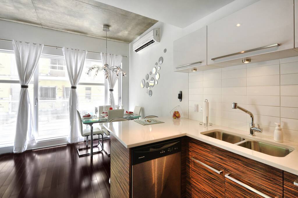 Large white quartz countertops in the lab kitchen.