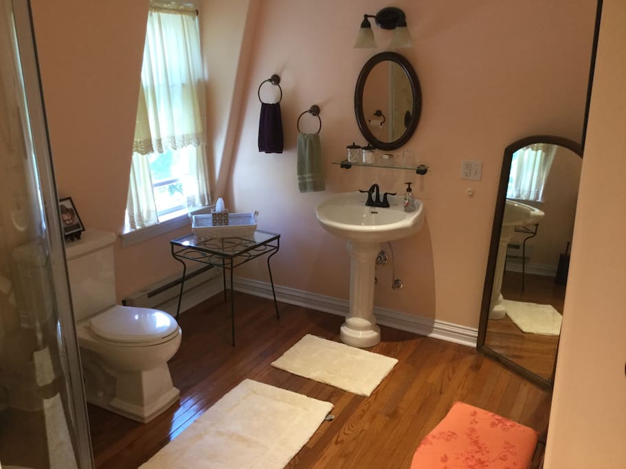 Bathroom includes brand new fixtures and hardwood floor