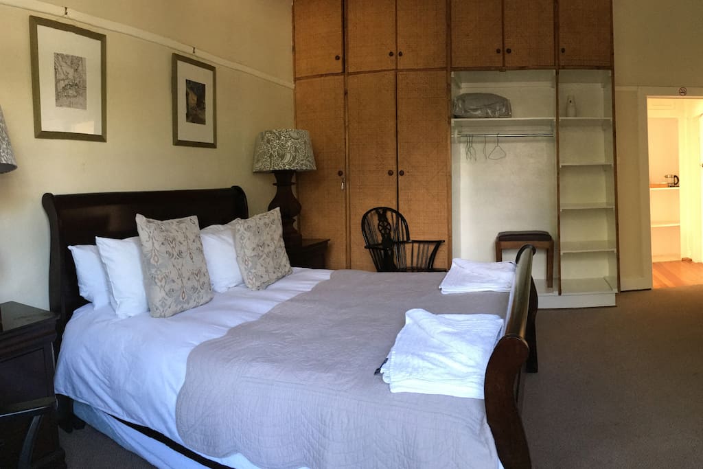 Bateleur guest room has Queen and single bed with ensuite (bath with shower over)